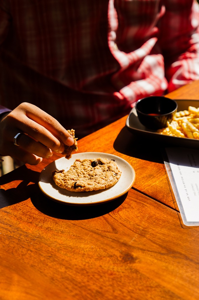 Cozy cafe ambiance with light leaks